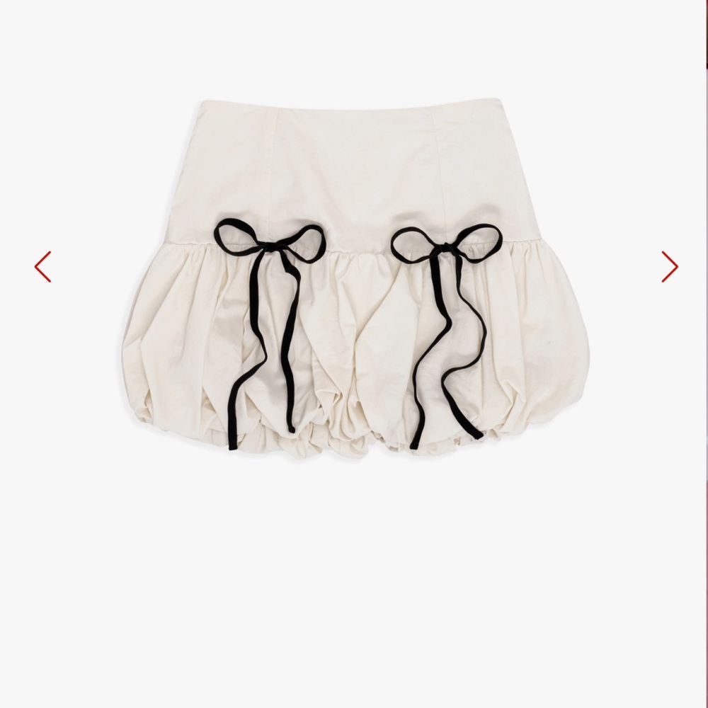 Lisa Says Gah Cream Skirt with Black Bow Accents